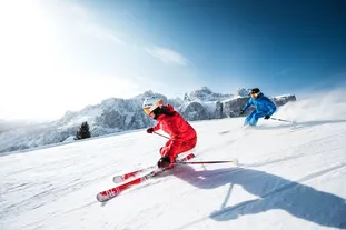 Downhill skiing on the slopes of Alta Badia in the Dolomiti Superski